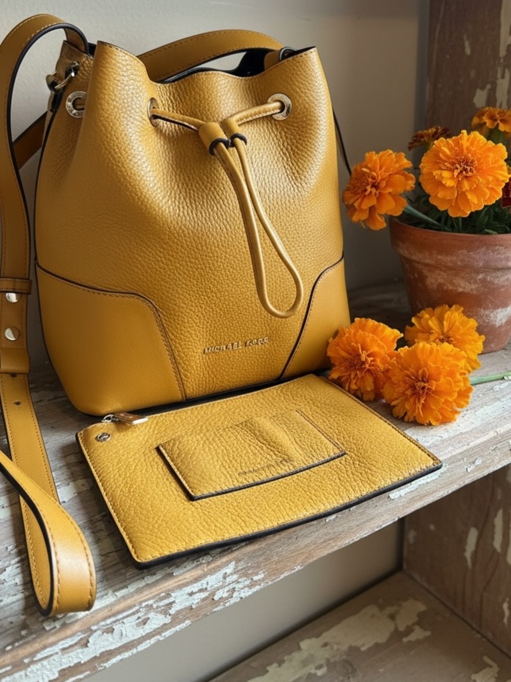 Michael Kors Cary Bucket Bag- Marigold in Pebbled Leather Drawstring Hobo
NWOT - Picture 4 of 7